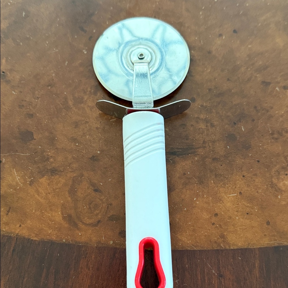 White and Red Pizza Cutter